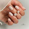Renfort sur ongles naturels avec vernis semi permanent cat eye et nude beige
