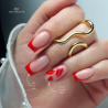 Pose réalisée avec le vernis semi-permanent Ti Amo, rouge intense en nail art