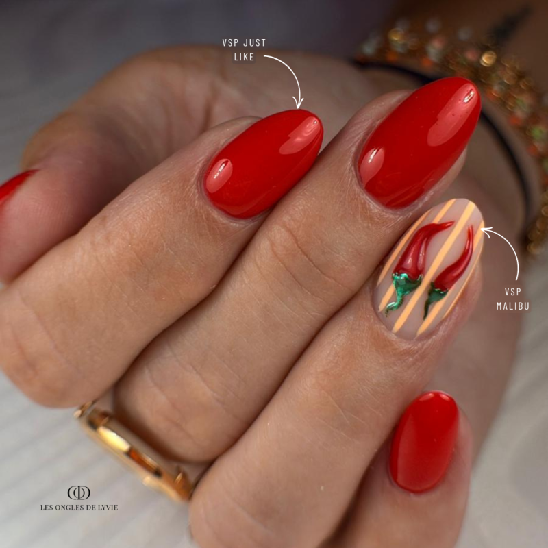 Pose d'ongles en amandes avec le vernis semi permanent, orange pastel néon
