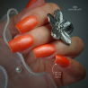 Pose d'ongles carrée avec le vernis semi permanent Cat eye Sun Kissed, orange saumon