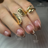 Pose d'ongles en amandes avec le vernis semi permanent Cat Eye Hazelnut, brun noisette